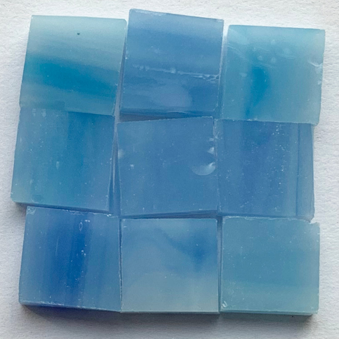 Detail of Tiffany Glacier Caribbean Blue with nine glass tiles